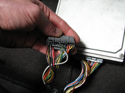 Inserting the ICM pin into the ECU connector